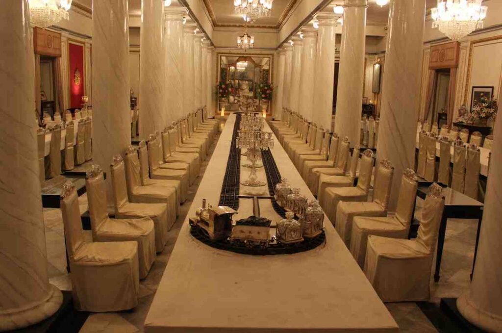 jai vilas palace dining room with silver train
